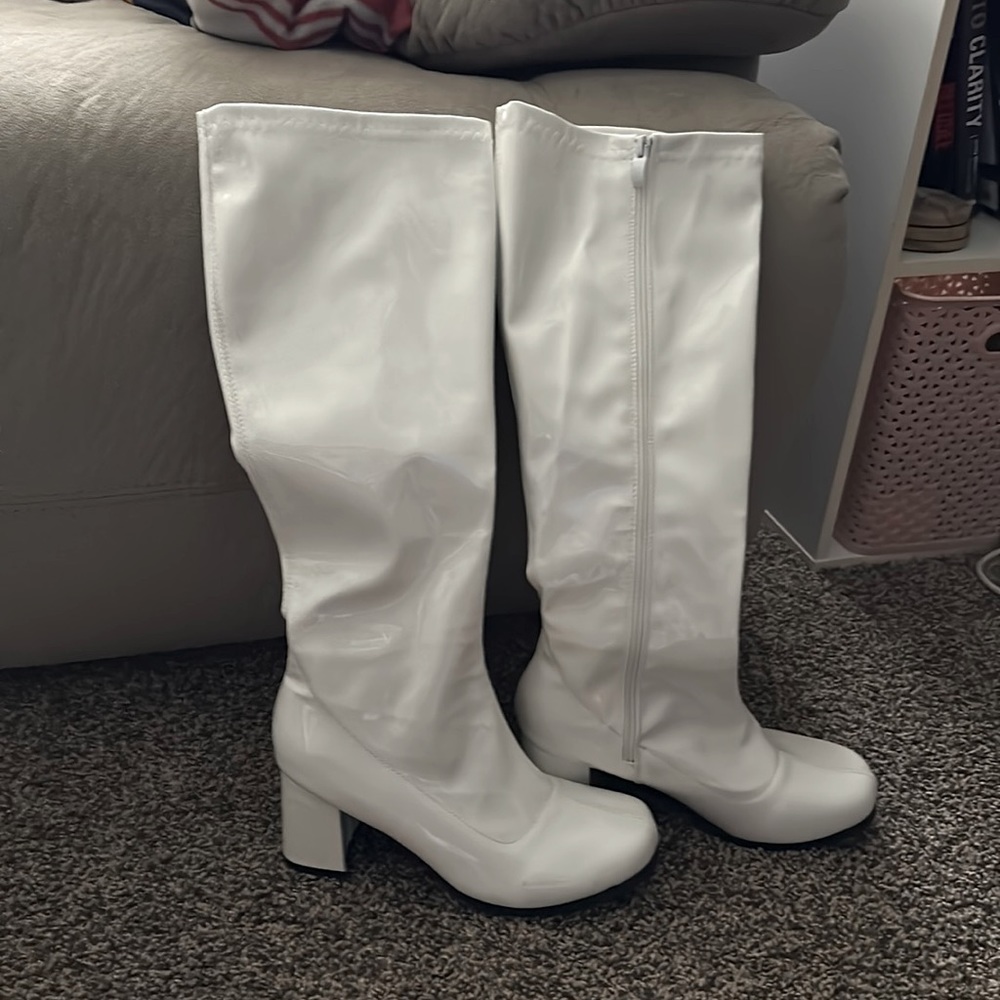 Knee high white patent leather boots